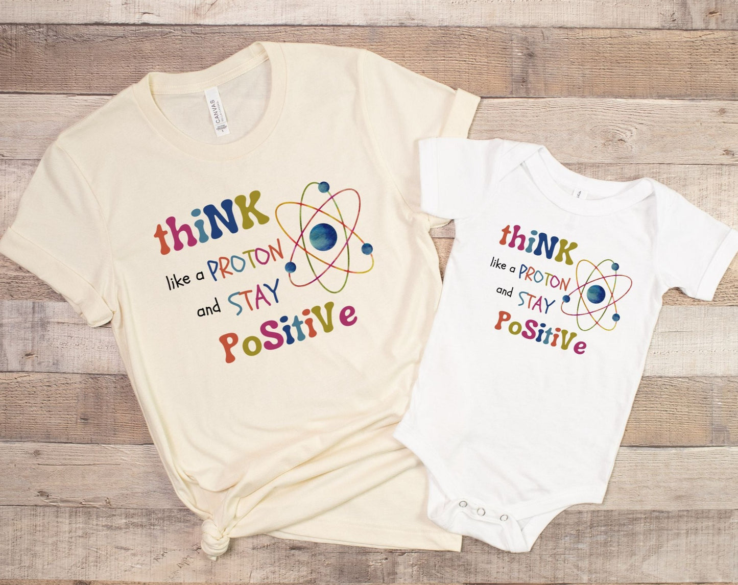 Think Like A Proton And Stay Positive ββ¨ Mommy & Me Graphic Tees