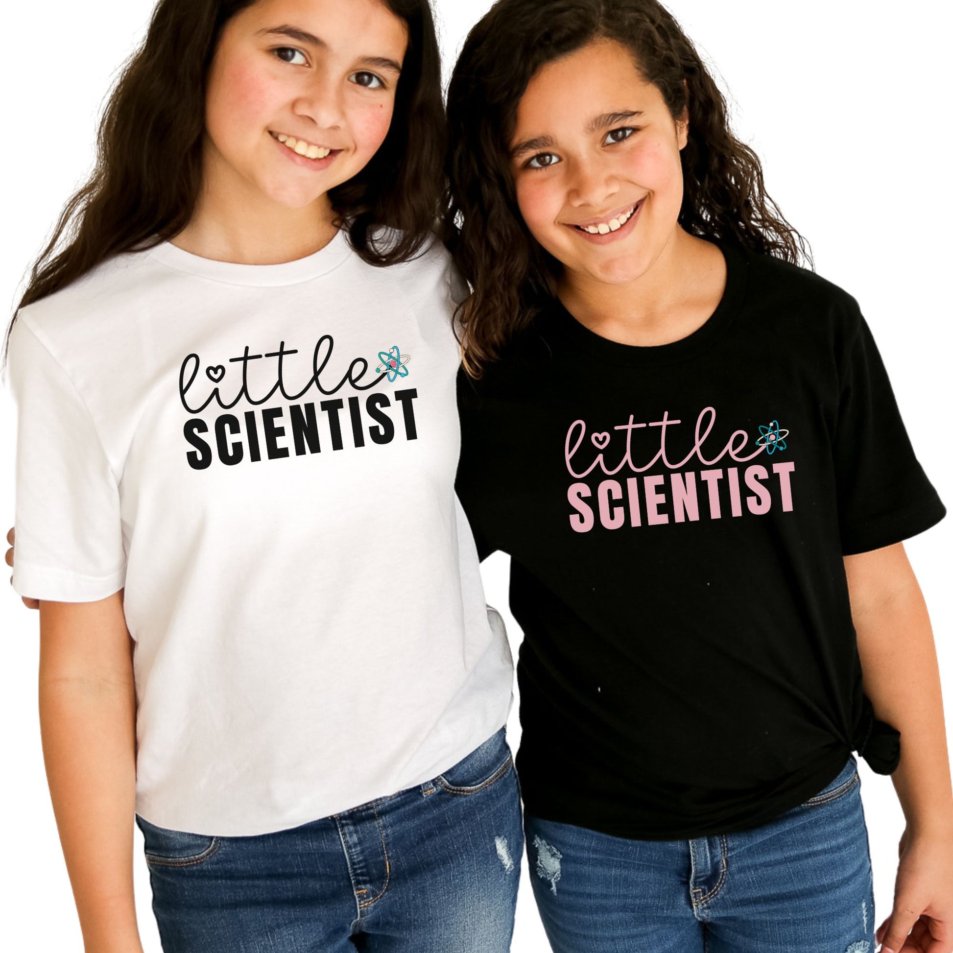 two young girls standing next to each other