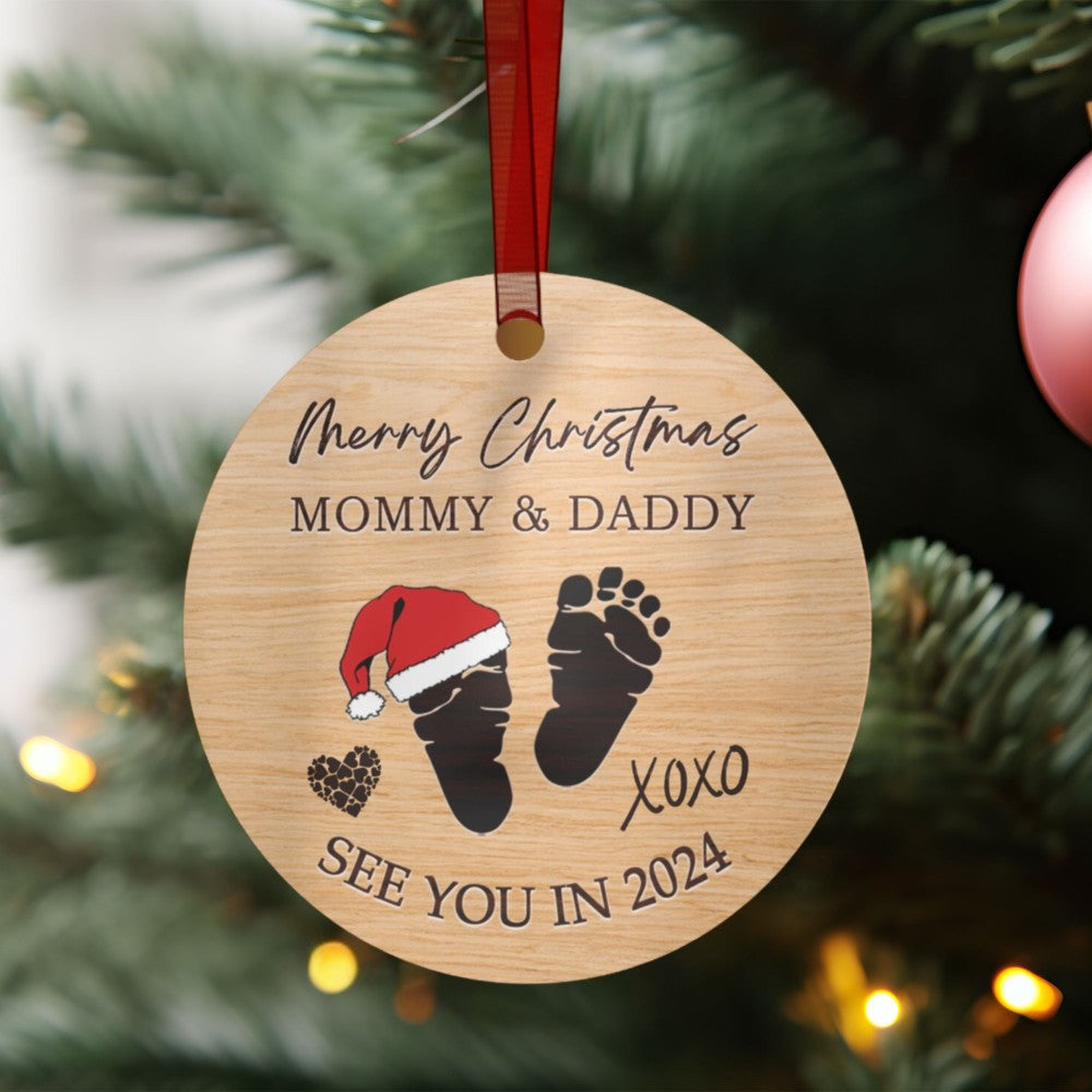 a wooden ornament hanging from a christmas tree