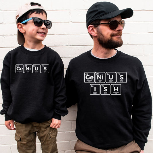 a man and a boy wearing black genius and genius sweatshirts